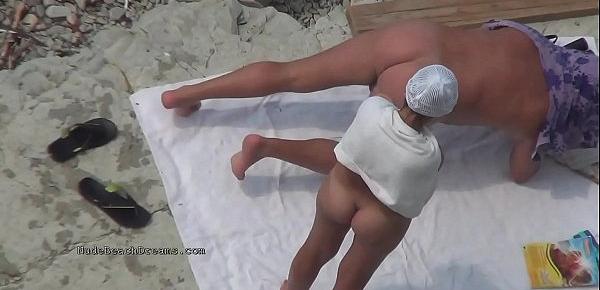 Real life nudists sunbathe at the nude beaches